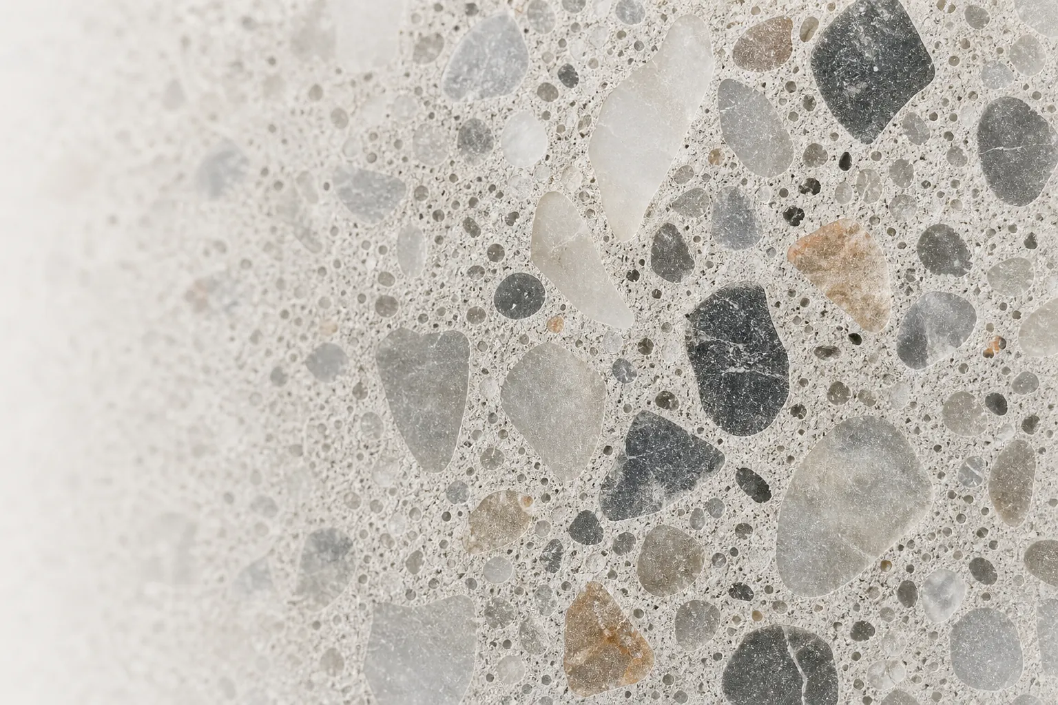 Conceptual concrete microstructure with visible mineral aggregate.